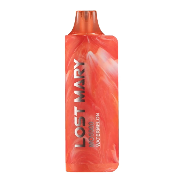 camel turkish and domestic blend - Person holding a FUME disposable vape exhaling vapor with tobacco flavour